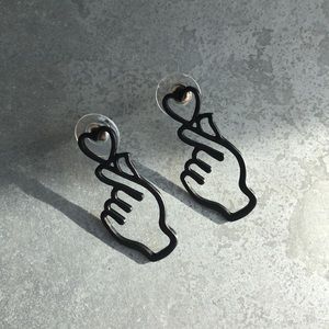 Matte black heart/hand earrings